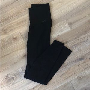 Nike zonal stretch leggings with side detail.